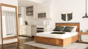 The bedroom can be combined into a sitting room that offers a retreat from the rest of the home or an office area, depending on how you want to approach the room. Layout Guide Tackling The L Shaped Studio Apartment Modsy Blog