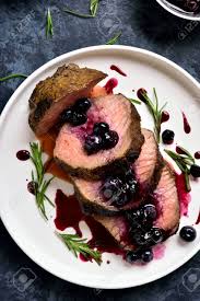 We did not find results for: Close Up Of Sliced Grilled Beef With Blueberry Sauce On White Plate Over Blue Stone Background Tasty Medium Rare Roast Beef With Berry Sauce Top View Flat Lay Stock Photo Picture And