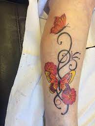 Pretty Girly Feminine Butterfly Tribal Swirls Flowers Leg Tattoo Women With Tattoos Colourful Flower Leg Tattoos Flower Thigh Tattoos Leg Tattoos