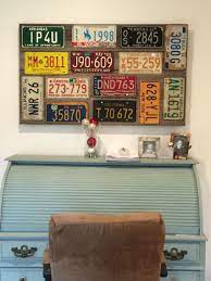 Decorate your home walls with wall art, photo frames, keyholders what are the popular wall decorations? Handmade License Plate Collage For My Office Love The Colors License Plate Decor Old License Plates License Plates Diy