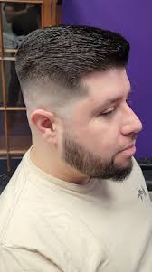 Where to get a cheap head shave and beard style?