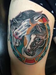 Traditional pharaoh's horses tattoos like many other traditional tattoo motifs, pharaoh's horses is a design based on religious iconography. Traditional Three Horse Head With Horse Shoe Tattoo Design For Thigh