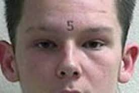 Superior homicide suspect charged with battering fellow inmate, again