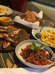 Guests enjoy the beach locale. Picture Of Atelier 61 Grill And Terrace Baku Tripadvisor