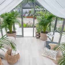 The simple hoop greenhouse pictured below was built by pondplantgirl on instructables and cost less than $25. Greenhouse Ideas Traditional And New Ways To Use A Garden Glass House