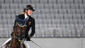 Kim raisner was seen punching the horse and telling the athlete to treat the horse harshly. Y5aohbve8henpm