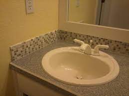 Many homeowners think about using a backsplash in their kitchen below are some different ideas to get you thinking about what you might like. Mosaic Tile For Bathroom Backsplash Bathroom Tile Designs Marble Tile Backsplash