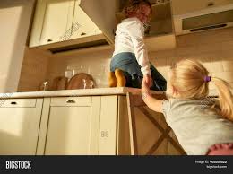 This kitchen hazards worksheet is a wonderful resource to complement a discussion about personal safety. Two Naughty Kids Image Photo Free Trial Bigstock