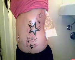 Tribal star tattoos and nautical star tattoos are great masculine star tattoo ideas for men. Body Tattoos On A Side Sensational Styles Design Press