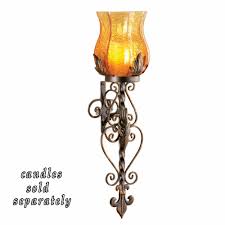 Hanging metal candle holder can use led light, candle, wax, oil lamp. Metal Wall Mounted Candle Sconce With Glass Candle Holder Buy Candle Holder Wall Mounted Candle Holder Metal Candle Holder Product On Alibaba Com