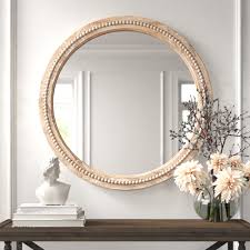 Large, round black metal wall mirror with gold bead trim. Kelly Clarkson Home Elle Round Wood Accent Mirror Reviews Wayfair