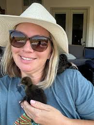 What type of medium sized dog is good around chickens and ducks?