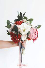 Inexpensive silk wedding flowers can be bought at most craft stores and at many discount stores. Find Stunning Winter Silk Flowers At Afloral Com To Diy Your Dream Bridal Bouque Wedding Bouquet Fake Flowers Diy Wedding Bouquet Fake Flowers Wedding Bouquets