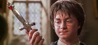 Harry Potter And The Chamber Of Secrets Harry Holding The Sword Of Godric Gryffindor He Used It To Defeat T Harry Potter Wizarding World Chamber Of Secrets