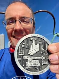 Nick overcomes cramp to complete Chicago Marathon