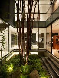 If you're considering adding modern planters to your outdoor space, it's a good idea to investigate all your options, and to do so by asking yourself the following. Indoor Garden Indoor Courtyard Interior Garden Garden Architecture