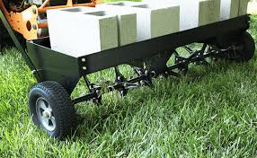 Otherwise, it would just roll over the top of the soil and tear up your grass. Spike Aerator Archives Brinly Hardy Lawn And Garden Attachments