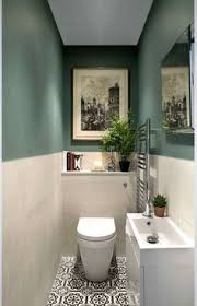 The wall hung toilet and dark floor also enhance the feeling of space. 200 Downstairs Toilet Ideas In 2020 Downstairs Toilet Bathroom Decor Bathrooms Remodel
