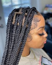 The other side has a stylish pattern while the braids have braid cuffs and beads. African Hair Braiding Styles Posts Facebook