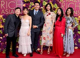 Crazy rich asians sets a playful tone early in the picture when a snappy new version of the old berry gordy and janie bradford rock 'n roll standard money (that's what i want) plays over the opening credits and establishing shots with its familiar lyrics performed in chinese. Crazy Rich Asians Cast Where Are They Now Flare
