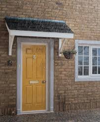 25cf your guests won't have to wait outside in the rain and cold anymore. 17 Door Rain Cover Ideas Door Overhang House Exterior Door Awnings