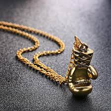 This small boxing glove necklace is similar to the actual boxing glove pendant owned and worn by sylvester stallone in real life as well. Rocky Balboa Boxing Glove Necklace Pendent Worn By Sylvester Stallone Jewelry Movement