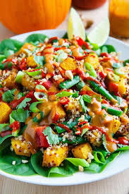 Roasted Pumpkin And Green Bean Quinoa Salad In Thai Peanut Dressing Recipe Salad Recipes Recipes Pumpkin Salad