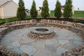 How do you build an outdoor fire pit with stone? Natural Stone Outdoor Fire Pit Klassisch Patio New York Von E Wyse Nurseries Inc Houzz