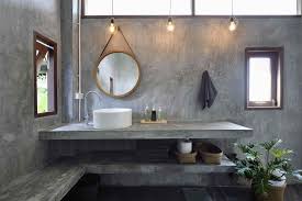 Industrial chic bathroom ideas that incorporate materials like cement, glass, brick, and steel and a black, white, and gray color palette that will never go out of style. Industrial Bathroom Ideas That Are Ultra Chic