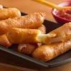 Breaded mozzarella patties / diameter 23 cm for a flat shape like in the video. 1