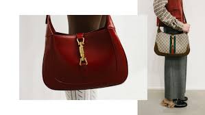 Gucci brown medium gg briefcase duffle bag. The Return Of Gucci Jackie Bag