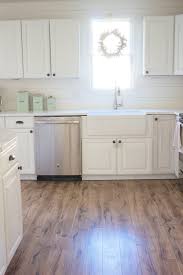 Home>>ask bob & betsy series>>should i install laminate flooring before or after i install my kitchen cabinets? Kitchen Progress Pergo Flooring Before And After Lauren Mcbride Pergo Flooring Kitchen Renovation Kitchen Remodel