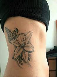 Black And Grey Butterfly Tattoo Designs Butterfly And Lily Tattoo Lily Tattoo Butterfly With Flowers Tattoo Butterfly Tattoo