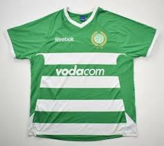The shirt is the traditional green and white hoops. Bloemfontein Celtic Home Football Shirt 2009 Sponsored By Vodacom