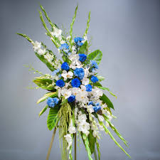 Pay tribute to a most wonderful spirit with assorted white flowers honor the life and memory of a beloved friend or relative with this exquisite standing spray, brimming with a. Blue And White Standing Spray Sf374 In Claremont Ca Sherwood Florist Uniqueart Gallery