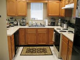 Staining builder grade oak cabinets. Repainting Kitchen Cabinets Pictures Ideas From Hgtv Hgtv