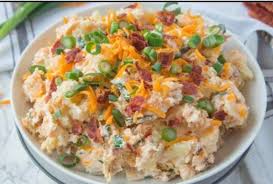Here's a potato salad with a bit of WOW factor!!  https://www.recipetineats.com/red-potato-salad-with-bacon-and-corn-no-mayo/