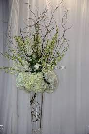 Rustic Arrangement In A Tall Pilsner Vase With Curly Willow White Larkspur Wh Curly Willow Centerpieces Spring Floral Arrangements Unique Floral Arrangements