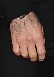 A picture of a planetary system inked of the left side of his head. David Beckham S 63 Tattoos Their Meanings Body Art Guru