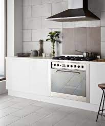 Tiles provide the perfect decor for a kitchen space. Kitchen With Large Wall Tiles Kitchen Wall Decor