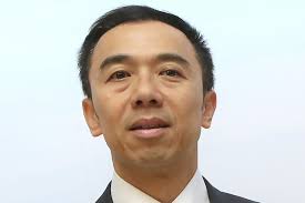 Ex-Hong Kong deputy economic development secretary and Airport Authority  boss charged with two counts of bribery over HK$510,000 property deal