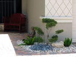 Use pebbles to decorate your garden. Garden Design Ideas With Pebbles