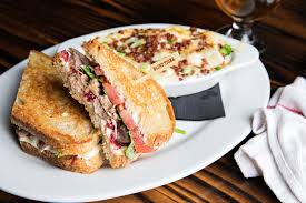 Hours may change under current circumstances Truffle Duck Sandwich Blind Tiger Pub King Street Hospitality Group Historical Pub Charleston Sc Andrew Cebulka Ph Delicious Cocktails Food Pub