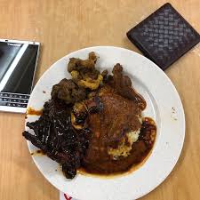 The name nasi kandar came about from a time when nasi (rice) hawkers or vendors would balance a kandar pole on their shoulder with two huge containers of rice meals. Nasi Ahmad Petaling Jaya Selangor