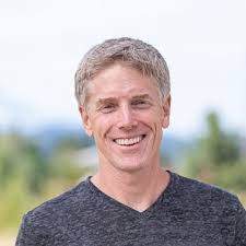 Seth O'Malley and I enjoying twin copies of Bon Appetit in the DC  airport...why?