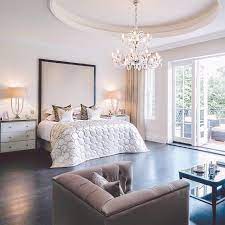 Maybe you would like to learn more about one of these? Beautiful Master Bedroom Large Upholstered Headboard Crystal Chandelier White Neutral Bedroom Home Home Decor Beautiful Bedrooms Master
