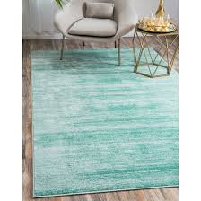 In the bedroom, rugs do not have to cover the length of the floor. Jill Zarin Uptown Turquoise Area Rug Reviews Wayfair