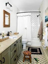 While it is common to only have one outdoor light, if your door in the center of a wall or porch, then placing a light either side of the door creates a beautiful symmetry which will complete your cottage's style. Kid Friendly Bathroom Cottage Style Bathrooms Bathroom Styling Master Bathroom Decor