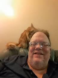 Hello, I'm Raymond and something to know about me is I have a ginger cat  named Simon .