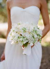 This Trick Will Make Your Wedding Feel More Expensive Wedding Flower Inspiration Sweet Pea Wedding Flowers White Wedding Bouquets